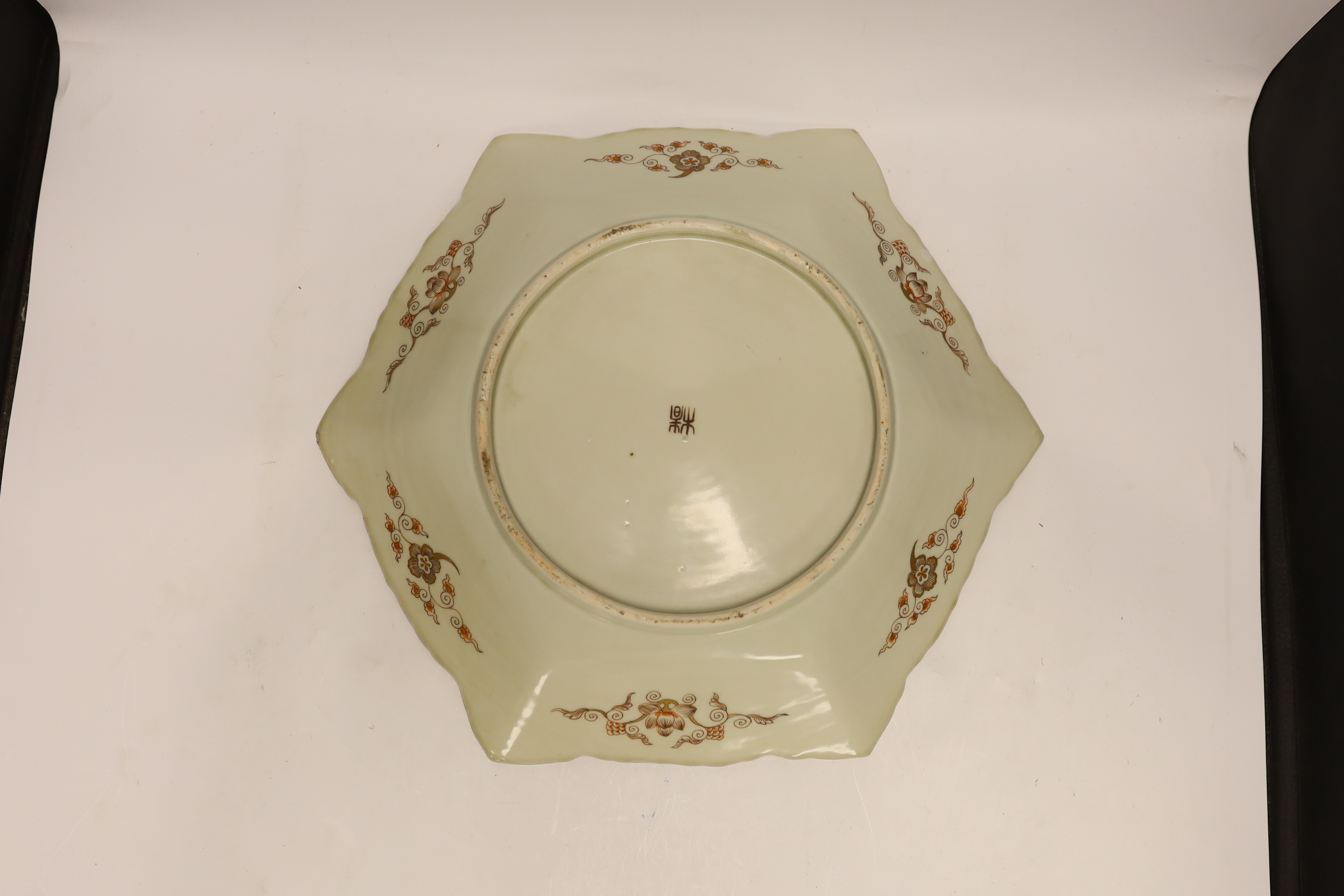 A large early 20th century Japanese enamelled porcelain hexagonal dish, 43cm